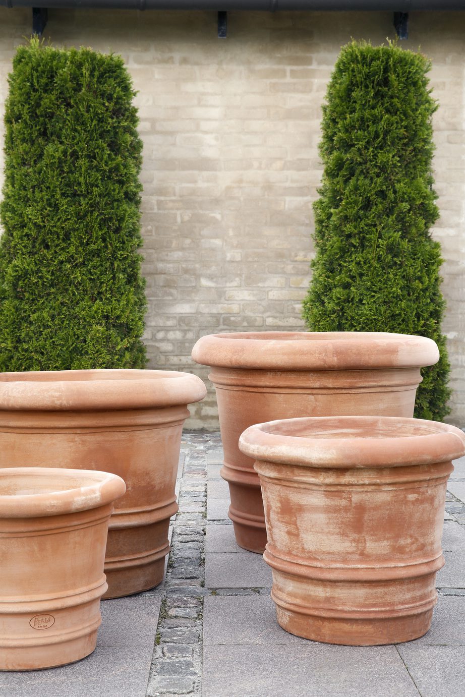 Raw ceramic outdoor pots rose
