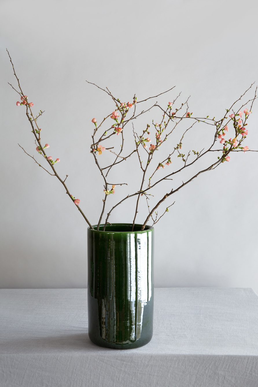 Green glazed vase with branches