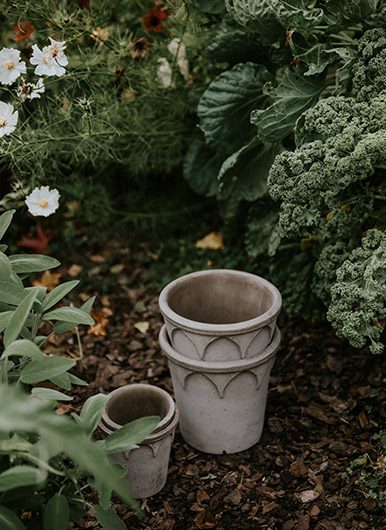 Clay pots for outdoor use - stacks of 'Elizabeth' pot collections by Bergs Potter. Photo: Anna Kubel.